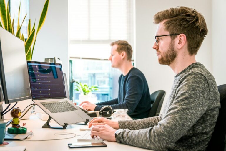 IT professionals working together representing business IT support