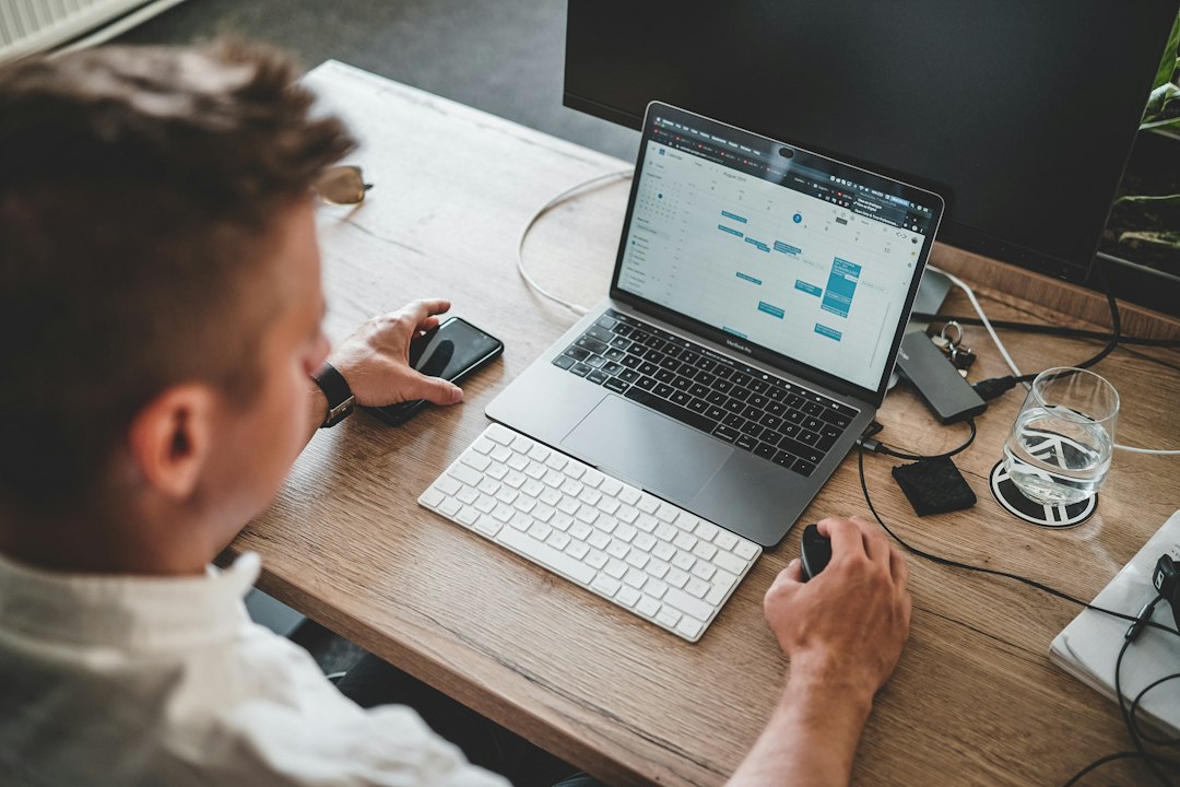 Business user working on a laptop representing small business cybersecurity