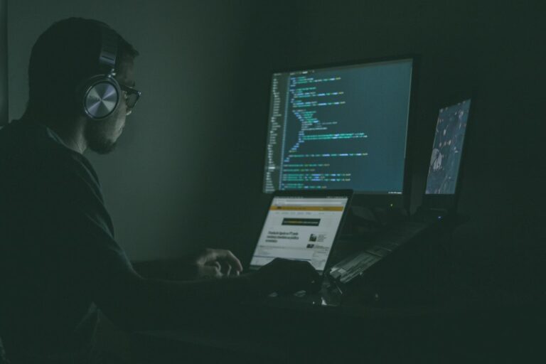 Computer screens and code representing penetration testing
