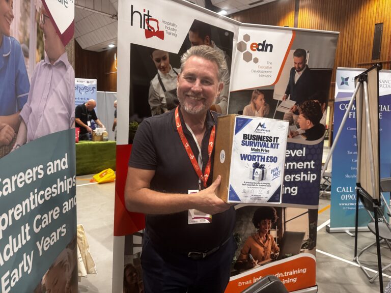 ML Services presenting the Business IT Survival Kit prize to the winner at the Better Business Show in Worthing