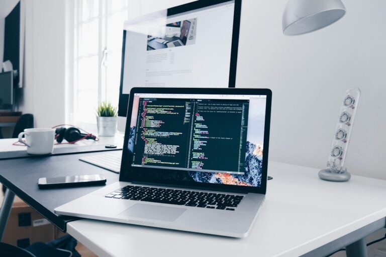 Laptop and workspace representing a managed IT support contract