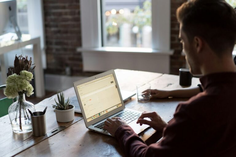 Small business professional working on a laptop in an office